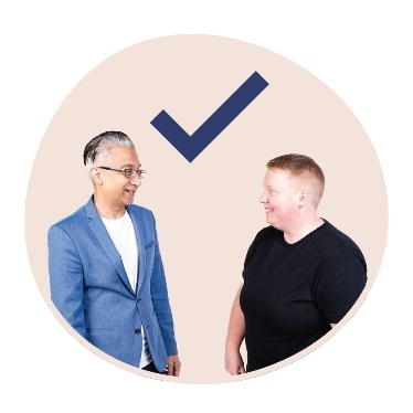 2 people next to each other and above them is a tick.