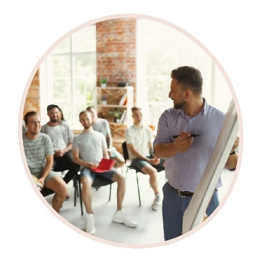 A person presenting at a meeting.